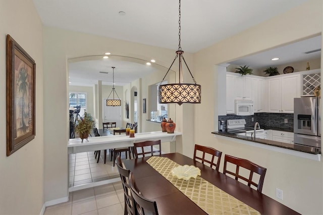 view of tiled dining space