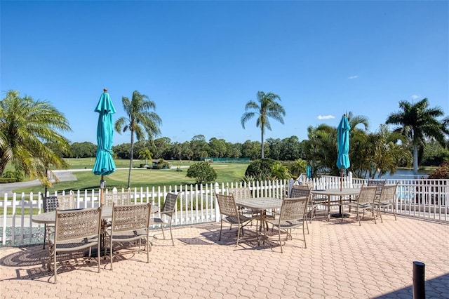 view of patio / terrace with a water view