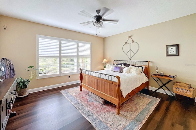 bedroom featuring ceiling fan and dark hardwood / wood-style flooring