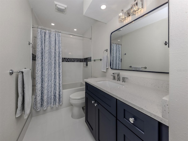 full bathroom featuring vanity, toilet, shower / bath combination with curtain, and tile patterned floors