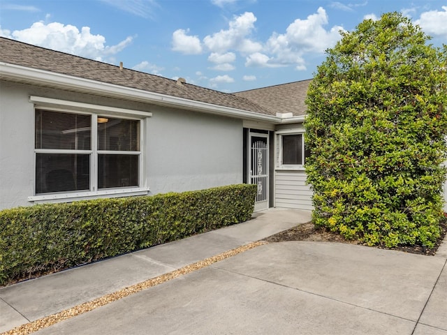 property entrance with a patio