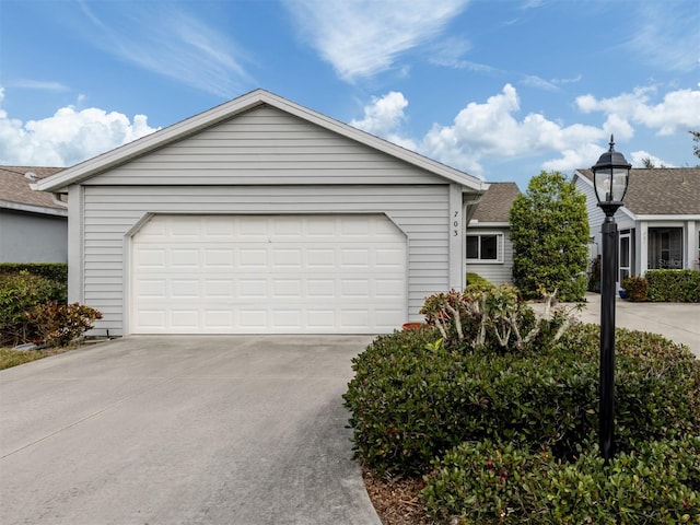 ranch-style home featuring a garage