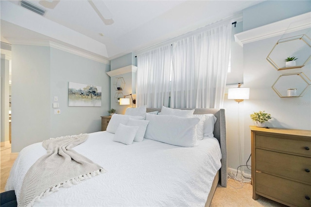 bedroom featuring ceiling fan and ornamental molding