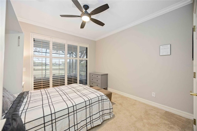 bedroom featuring light carpet, ceiling fan, and crown molding