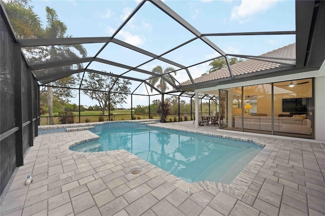 view of pool featuring a lanai and a patio area