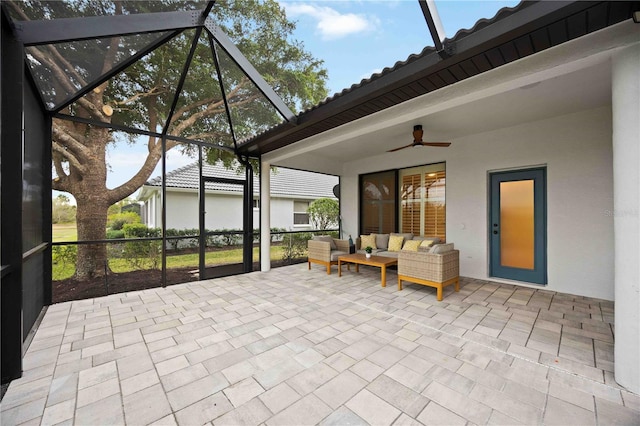 unfurnished sunroom featuring ceiling fan