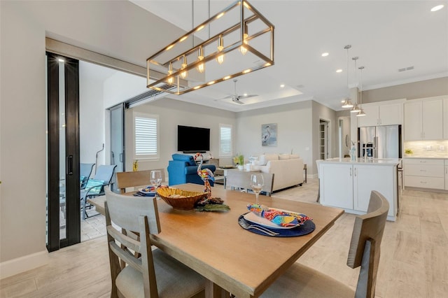 dining room with light hardwood / wood-style flooring