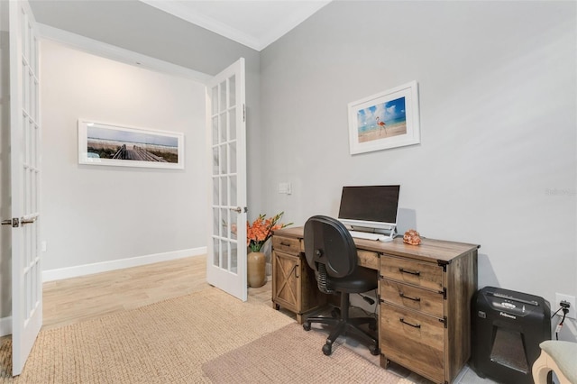 home office featuring ornamental molding and french doors