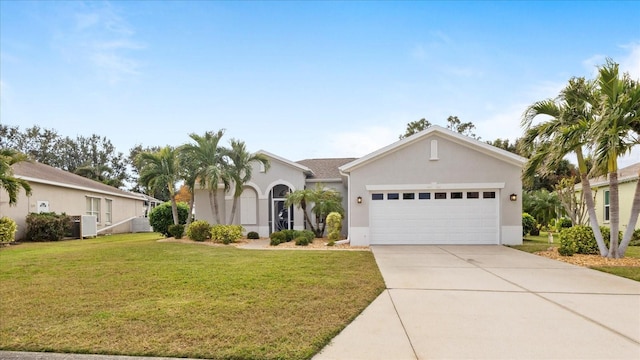 ranch-style house featuring a front lawn and a garage