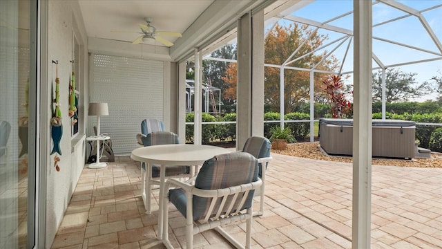 sunroom / solarium with ceiling fan