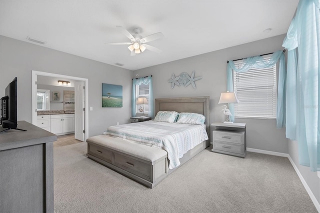 bedroom featuring visible vents, ceiling fan, baseboards, and multiple windows