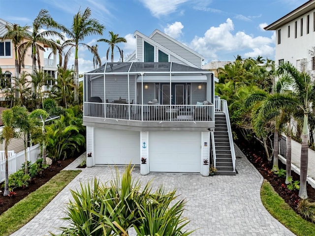 raised beach house with a garage