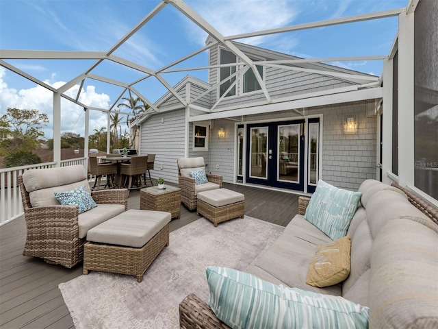 sunroom / solarium featuring vaulted ceiling and a wealth of natural light