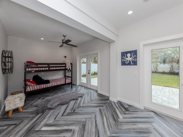 bedroom with ceiling fan, access to exterior, and french doors