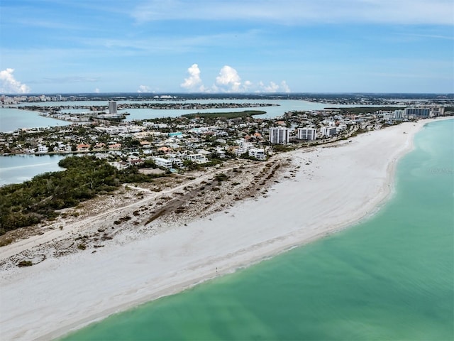 aerial view with a water view and a view of the beach