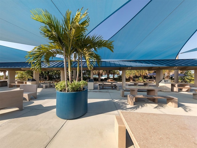 view of community featuring a gazebo and a patio