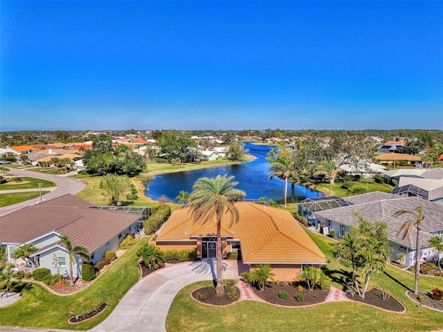 bird's eye view with a water view and a residential view