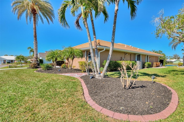 view of front of home with a front lawn