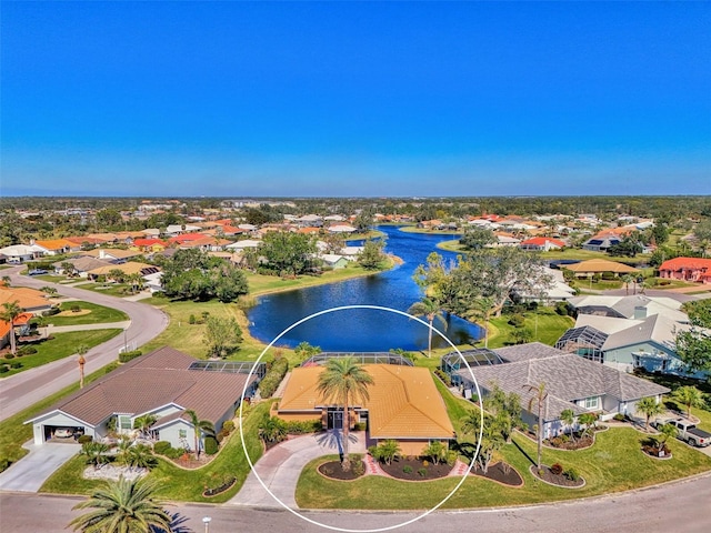 drone / aerial view with a water view