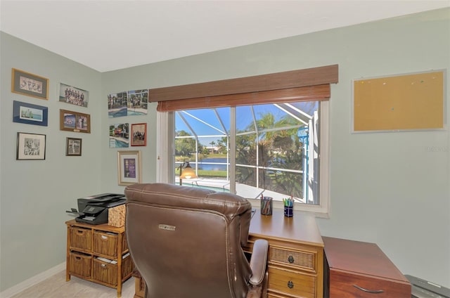 office area featuring baseboards