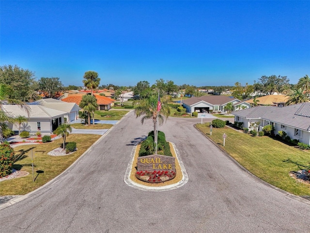 view of street with curbs and a residential view