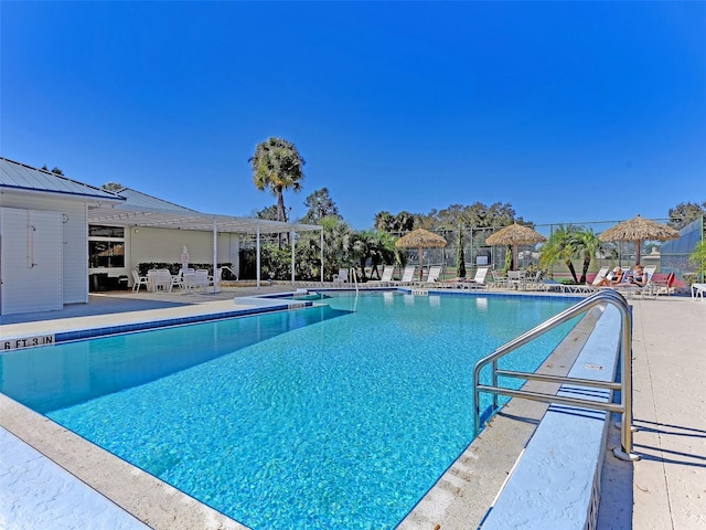 community pool with a patio