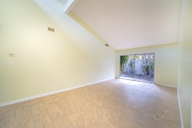 empty room with vaulted ceiling