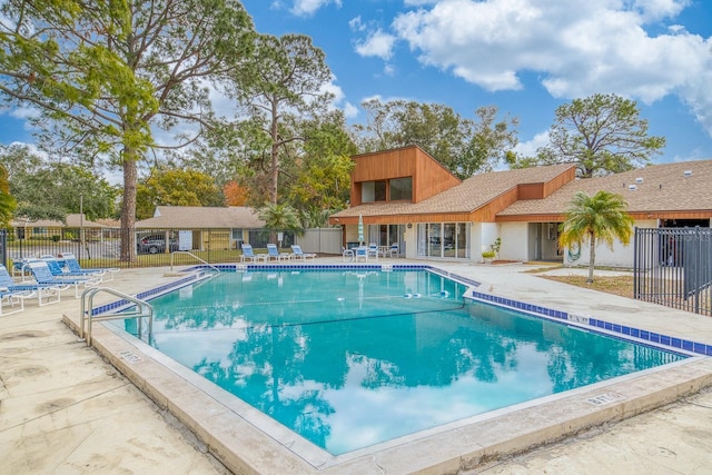 view of swimming pool with a patio