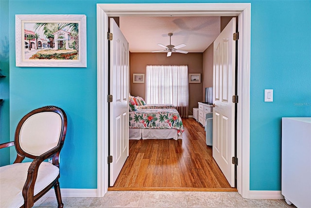 bedroom with a textured ceiling and ceiling fan