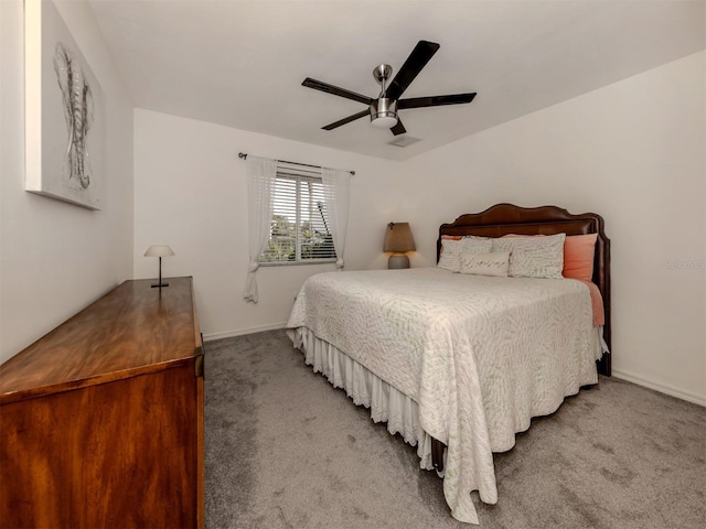 bedroom with ceiling fan and carpet