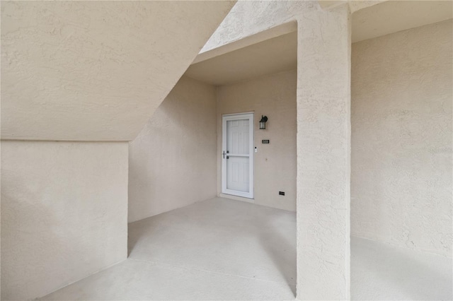 doorway to property featuring a patio area