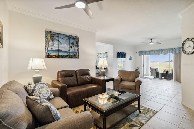 tiled living room with ornamental molding and ceiling fan