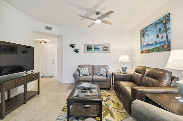 living room with crown molding, ceiling fan, and light tile patterned floors