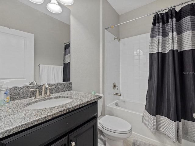 full bathroom featuring toilet, vanity, and shower / bath combination with curtain