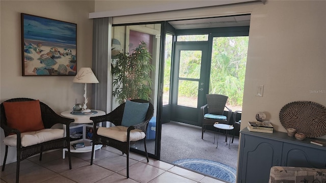 sitting room with light tile patterned flooring