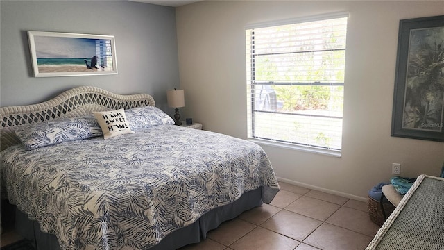 bedroom featuring light tile patterned floors