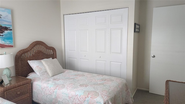 bedroom with a closet and carpet