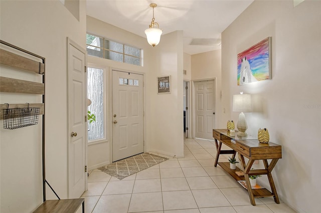 foyer with light tile patterned floors