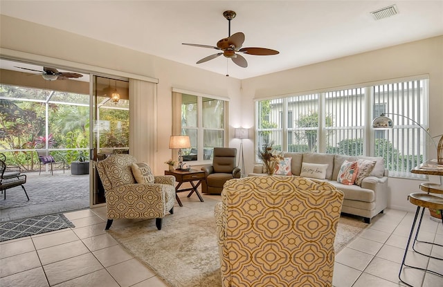 sunroom / solarium with ceiling fan