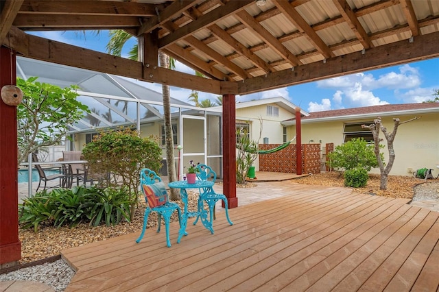 wooden terrace featuring a lanai