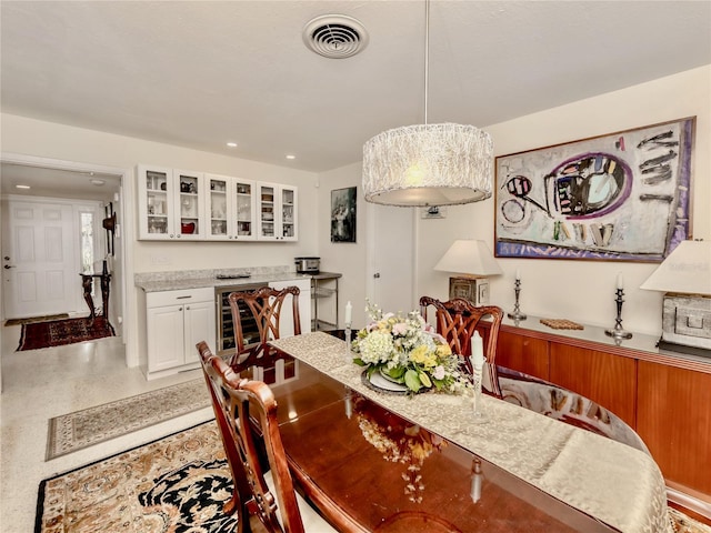 dining room with beverage cooler