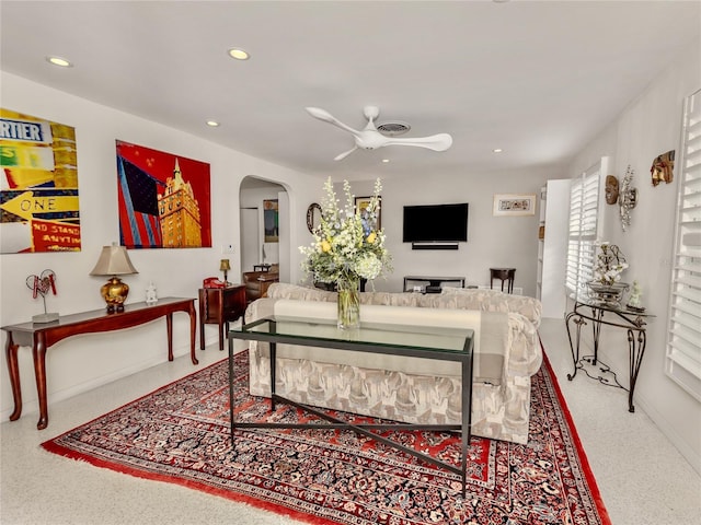 living room with ceiling fan