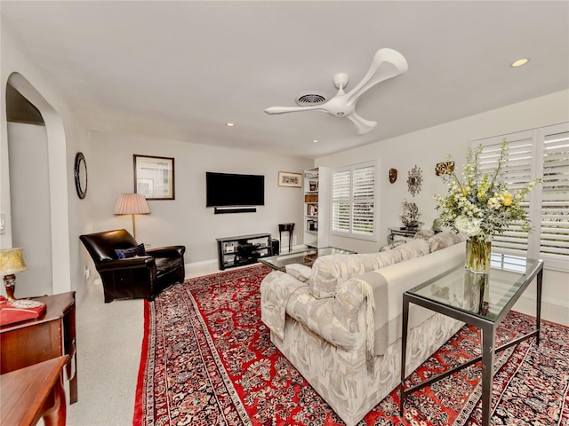 living room with ceiling fan