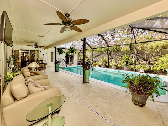 view of swimming pool featuring ceiling fan, an outdoor living space, a patio, and glass enclosure