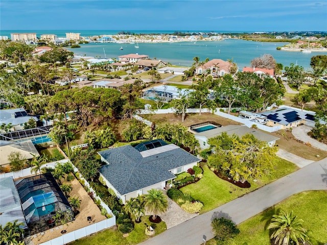 birds eye view of property featuring a water view