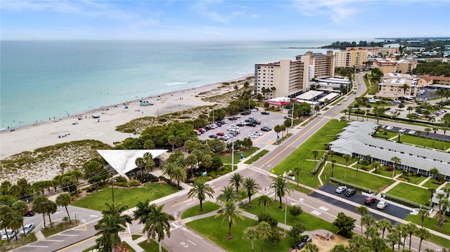 bird's eye view with a view of the beach and a water view