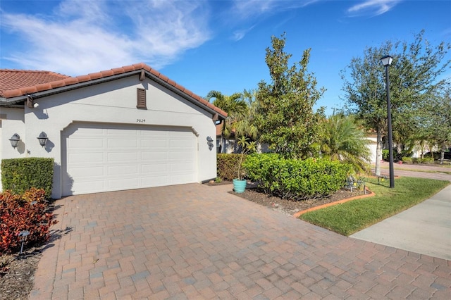 view of front of house with a garage