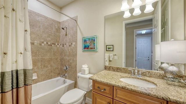 full bathroom featuring vanity, shower / bath combination with curtain, and toilet