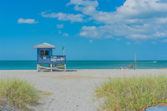 view of water feature with a beach view