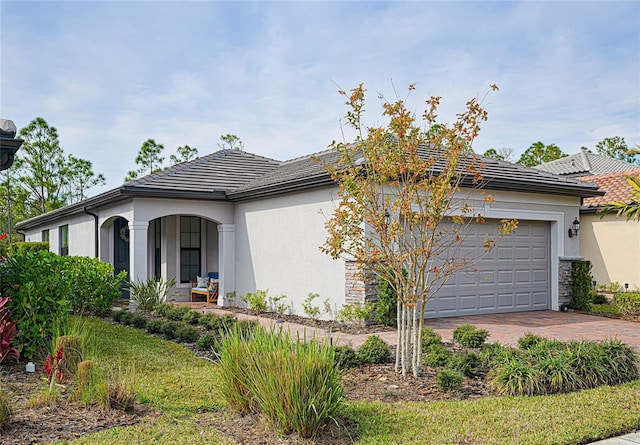 view of front of home with a garage